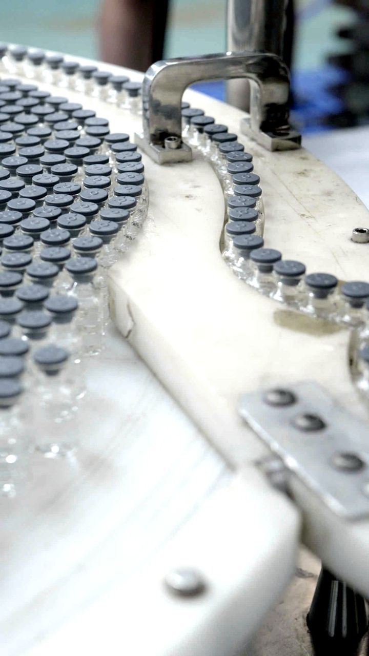 Vials on the filling-line conveyor