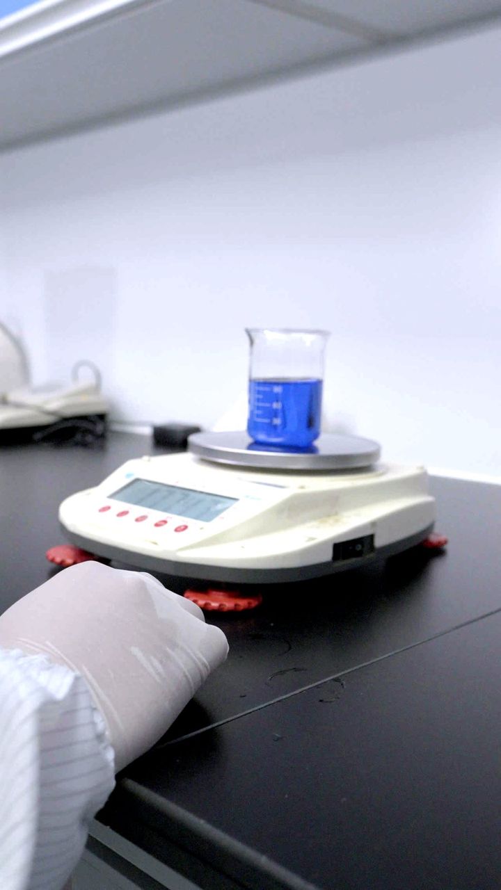 Analytical balance on the weighing bench